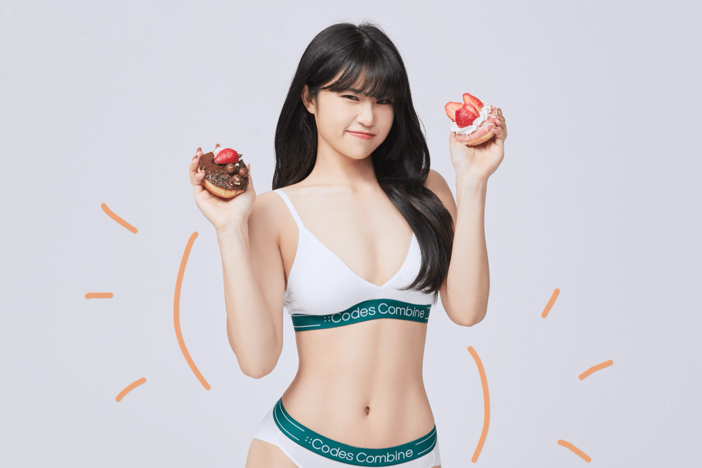 Liposuction Surgery on Abdomen, Thighs, Arms Results Fit woman in white sportswear holding desserts.
